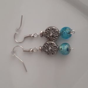 Handcrafted boho earrings .